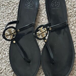 Tory Burch Black Sandals with Gold Emblem